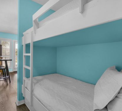 Twin bunks in nook in hallway