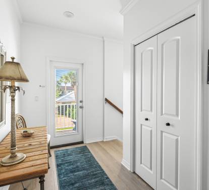 Second floor hall with game closet and baby items to share