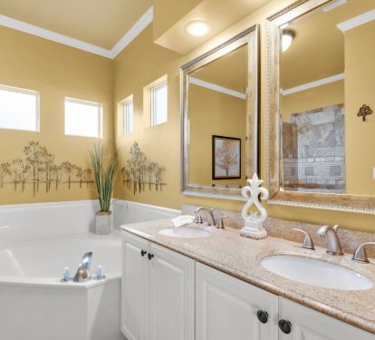 Master bathroom with large soaking tub and double vanity.
