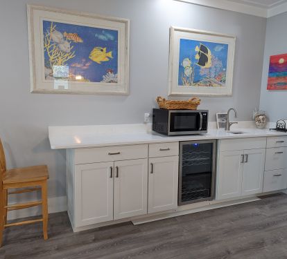 Long counter, mini fridge, microwave &amp; wet bar for entertaining.