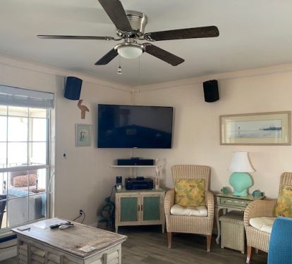 Living room with Home Theater System, DirecTV with Sunday ticket and access to streaming Services.