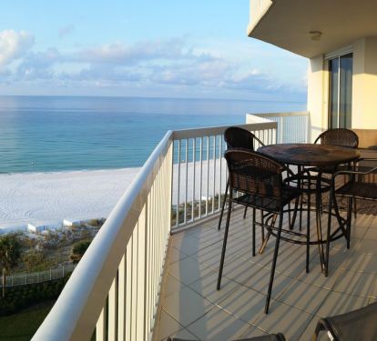 Endless water views! large outdoor sectional, two chaise lounges, and dining set.