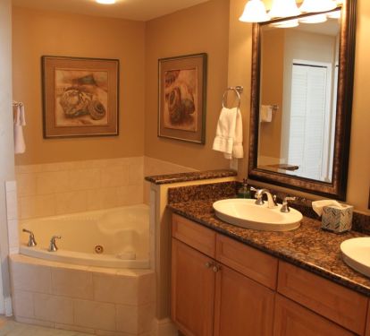 Bathrooms are all granite counter-tops with Khoeler sinks