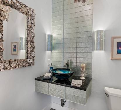 Half-bath for first floor, custom made oyster chandelier and mirror