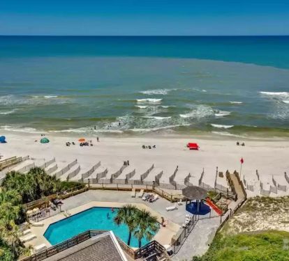 Aerial view of gulf-front pool area 
