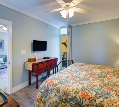 Both master k suites are off the living area, all have doors to patio.