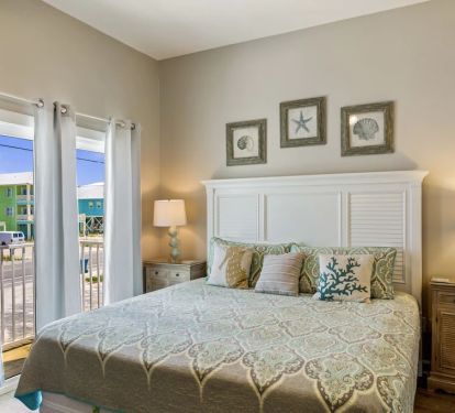First Level King Bedroom. Walkout balcony. TV with cable. 