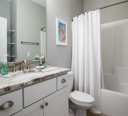 Full bath across the hall from main floor guest room