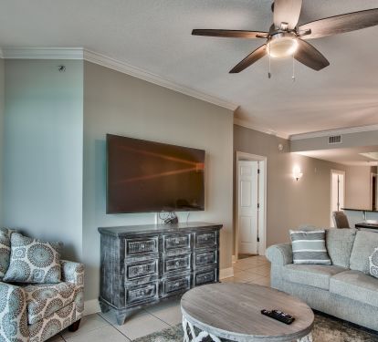 Gather the family for movie nights with comfortable seating and our 65" Smart TV! 