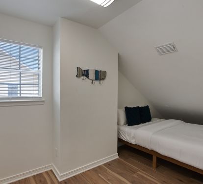 Upper level Queen bed (Yes, it is a queen bed!)