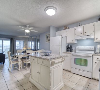 Kitchen with dining area shown 