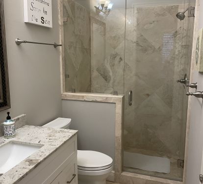Second master bedroom has its private bath with tile shower