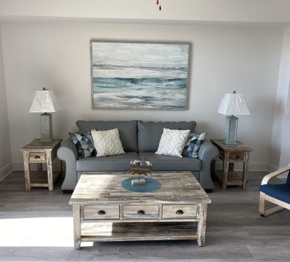 Relax in the soft colors of the sea in Crabby' Cove - Watch the 70" Samsung TV!