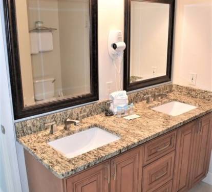 Master suite bathroom. Wall mounted hairdryer. Soft close drawers.