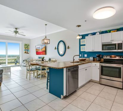 Kitchen with Granite Counter tops and Stainless Appliances.