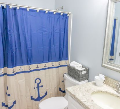 Shared Hall Bath that is also accessible from the Custom Bunk Room