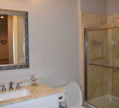 Shared bath for the queen and bunk rooms