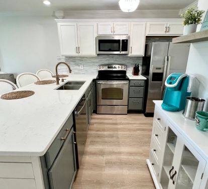 Kitchen with Coffee/Wine Station Fully stocked with serving and cookware.