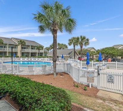One of five available pools is just steps off your patio