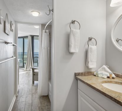 Bathroom door moved to provide view from bedroom