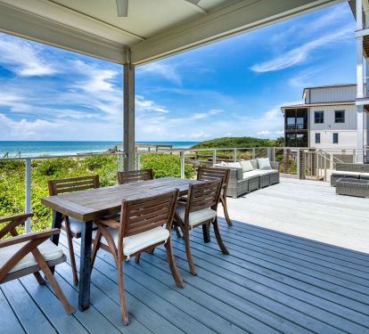 Spacious deck off main living with outdoor dining and oversized sectional