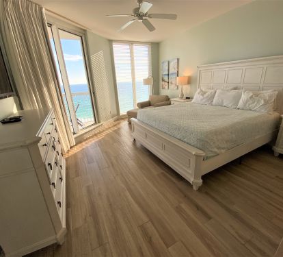 Bdrm 1- Luxurious master suite with king bed and 60 inch high def Tv.