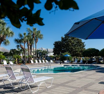 Main pool which is one of two in the gated community. One is heated seasonaly