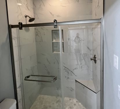 Downstairs bathroom just remodeled in 2022 with walk in shower