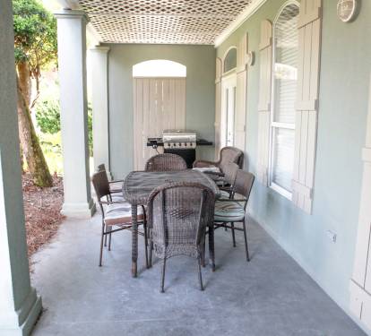 Porch view with gas grill &amp; seating