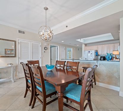 Large dining table with 6 chairs..there are also 2 bar stools for added seating