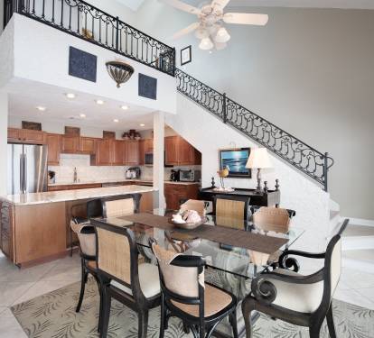 Stairs to the loft located off the dining area.