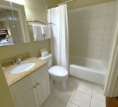 Bathroom 2... full bath with tub and shower.  Access to hallway and guest bdrm.