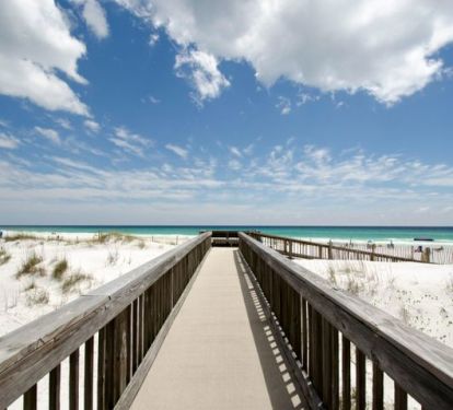 Boardwalk to the beach with ramp at the end