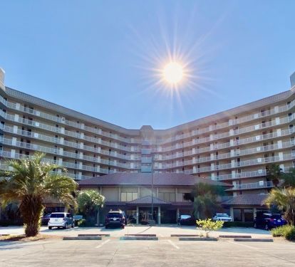 Resort check in office in front of condo with plenty of free parking