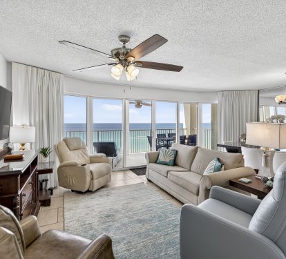 Living Room/Dining Room with floor to ceiling views of the Gulf.  Free WIFI and Direct TV plus Roku.