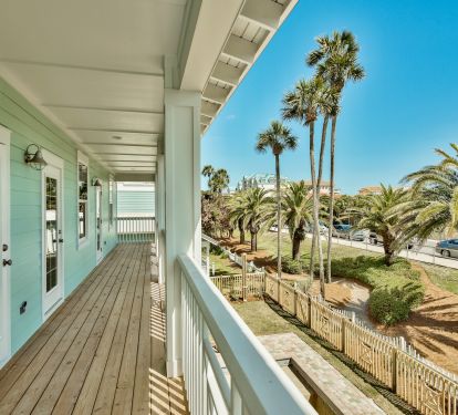2nd floor balcony has 6 adirondacks with small tables for coffee or happy hour