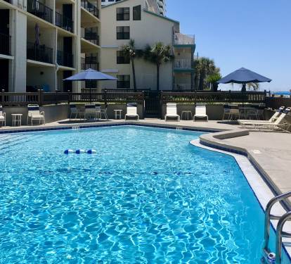 Beautiful pool just steps away from the beach.