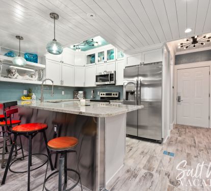 Kitchen counter sitting area with color changing LED lighting 