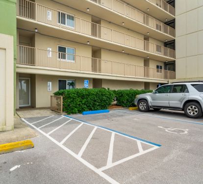 Handicap parking on right, front door to the left.