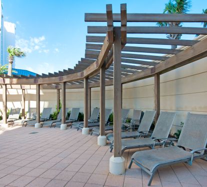 The west side of the pool has a zero entry pool area and is shaded much of day