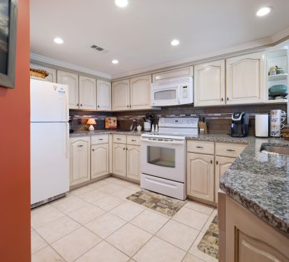 kitchen with recessed lighting on dimmer switch