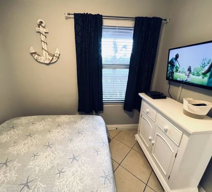 QUEEN 3RD BEDROOM WITH WALL MOUNTED SMART TV!