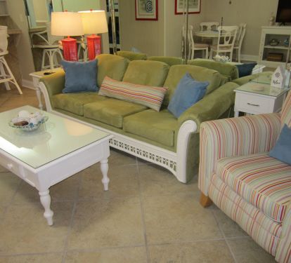 Living room with queen sleeper sofa and two recliners.