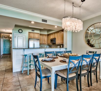 Extra large dining room table with seating for 8 plus 4 stools at breakfast bar