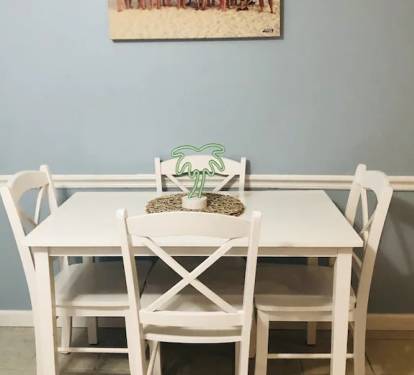 small table and chairs in familiy room