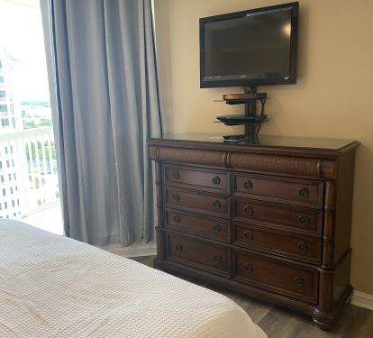 Middle Bedroom with King Bed, dresser and tv
