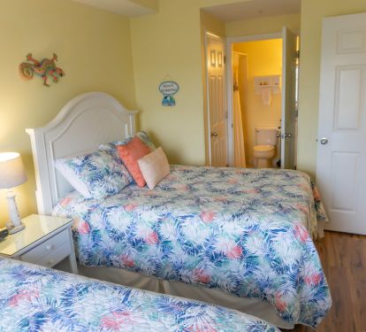 two full beds with gorgeous bathroom in kids room