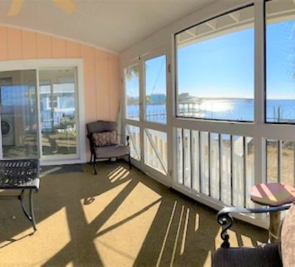 Screen room with beautiful view of the bay