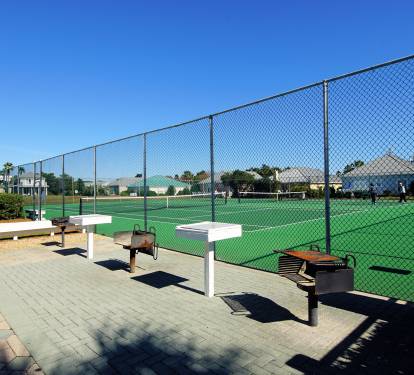 Tennis courts, pickle ball courts, shuffle board and basketball hoop