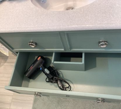Hairdryers are under sinks in all the full baths!